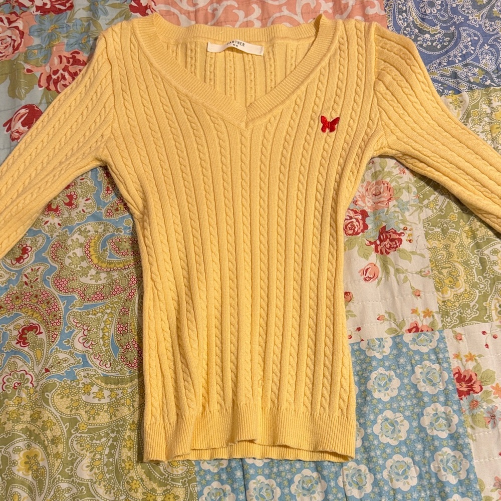 yellow cableknit sweater